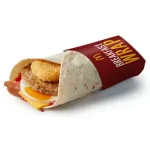 McDonald's breakfast wrap with ketchup  - one of the highest calorie item on McDonalds UK breakfast menu 
